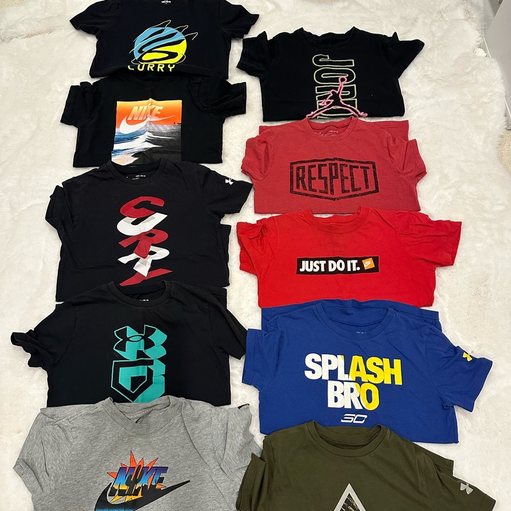 Boys size medium Nike Under Armour Black Short Sleeve Graphic Tee